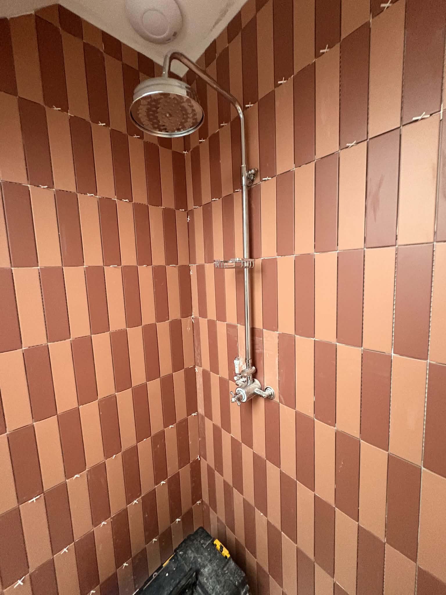 Terracotta vertical brick-pattern shower wall, Newcastle